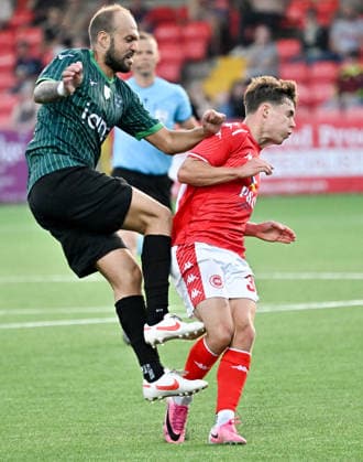 UEFA Champions League First Qualifying Round Second Leg, Inver Park, Belfast, Northern Ireland 14 7 2026 Larne vs Tre Fiori Larne™s Matty Lusty with Tre Fiori™s Simone Rea Matty Lusty with Simone Rea 14 7 2026  Copyright: xStephenxHamilton Inphox Larne v Tre Fiori-031