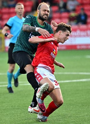 UEFA Champions League First Qualifying Round Second Leg, Inver Park, Belfast, Northern Ireland 14 7 2026 Larne vs Tre Fiori Larne™s Matty Lusty with Tre Fiori™s Simone Rea Matty Lusty with Simone Rea 14 7 2026  Copyright: xStephenxHamilton Inphox Larne v Tre Fiori-032