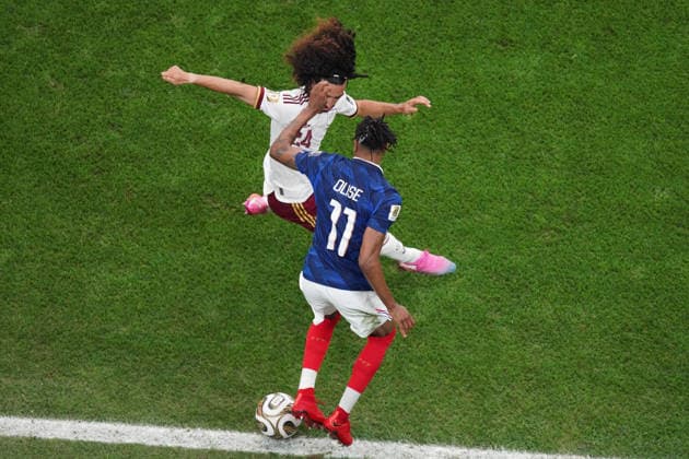 Michael Olise (R) of France vies for the ball with Marc Cucurella of Spain during the 2026 FIFA World Cup, WM, Weltmeisterschaft, Fussball semifinal match between France and Spain at AT&T Stadium in Arlington, United States, 14 July 2026. FIFA World Cup 2026 semifinals - France vs Spain !ACHTUNG: NUR REDAKTIONELLE NUTZUNG!  Copyright: xKennethxFernandezx AMDEP8690 20260714-55020894210_1