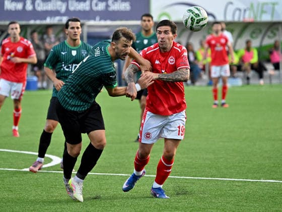 UEFA Champions League First Qualifying Round Second Leg, Inver Park, Belfast, Northern Ireland 14 7 2026 Larne vs Tre Fiori Larne™s Kevin O Hara with Tre Fiori™s Tom Syku Kevin O Hara with Tom Syku 14 7 2026  Copyright: xStephenxHamilton Inphox Larne v Tre Fiori-039