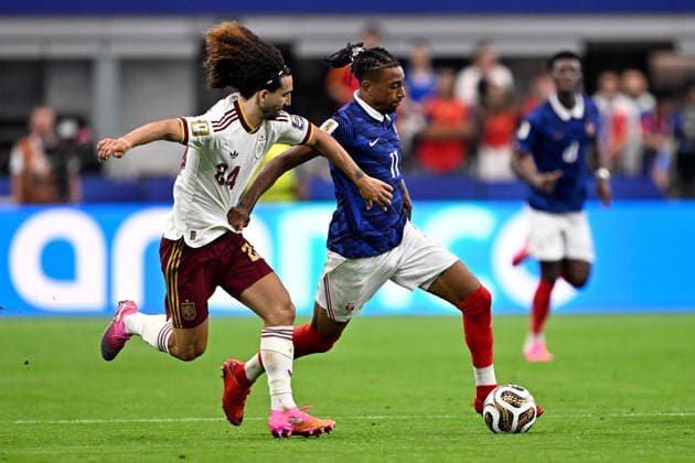 2026-07-14 France v Spain - Semi Final - FIFA World Cup, WM, Weltmeisterschaft, Fussball 2026 ARLINGTON, UNITED STATES - JULY 14: Marc Cucurella of Spain, Michael Olise of France during the Semi Final - FIFA World Cup 2026 match between France and Spain at Dallas Stadium on July 14, 2026 in Arlington, Texas. (Photo by Pablo Morano BSR Agency) Arlington United States Content not available for redistribution in The Netherlands directly or indirectly through any third parties. Copyright: xBSRxAgencyx