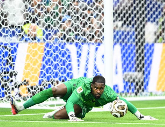 ARLINGTON, TEXAS - JULY 14: France goalkeeper Mike Maignan keeps the ball in play during the FIFA World Cup, WM, Weltmeisterschaft, Fussball 2026 Semi Final match between France and Spain at Dallas Stadium on July 14, 2026 in Arlington, Texas.  Copyright: xMBxMediax