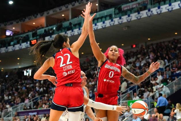 July 14, 2026, Toronto, On, CAN: Toronto Tempo s Marina Mabrey (3) passes between Washington Mystics Sonia Citron (22) and Shakira Austin (0) during first half WNBA, Basketball Damen, USA basketball action in Toronto on Tuesday, July 14, 2026. Canada News - July 14, 2026  - ZUMAc35_ 20260714_zaf_c35_138 Copyright: xChrisxYoungx
