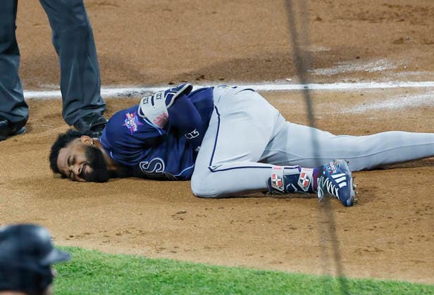 American League third baseman Junior Caminero lies on the ground after being hit by a pitch from National League pitcher Riley O Brien in the third inning of the 2026 MLB, Baseball Herren, USA All-Star Game at Citizens Bank Park in Philadelphia, Pennsylvania, on Tuesday, July 14, 2026.  PHI20260714918 LAURENCExKESTERSON