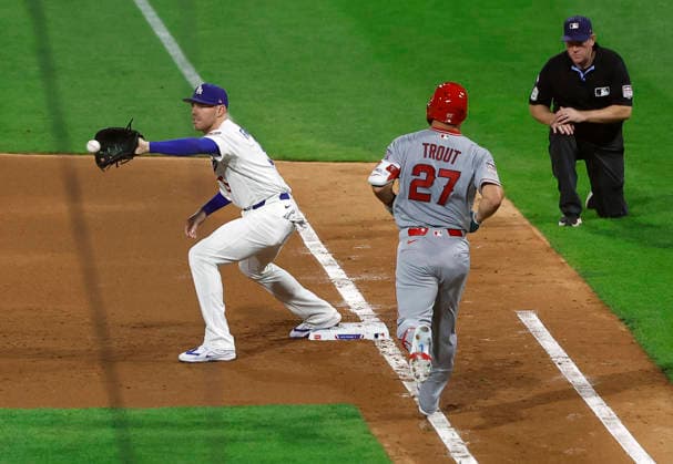 National League first baseman Freddie Freeman puts out American Leagues Mike Trout in the fourth inning of the 2026 MLB, Baseball Herren, USA All-Star Game at Citizens Bank Park in Philadelphia, Pennsylvania, on Tuesday, July 14, 2026.  PHI20260714924 LAURENCExKESTERSON