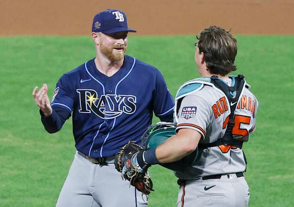 American League pitcher Drew Rasmussen talks to catcher Adley Rutschman in the seventh inning of the 2026 MLB, Baseball Herren, USA All-Star Game at Citizens Bank Park in Philadelphia, Pennsylvania, on Tuesday, July 14, 2026.  PHI20260714937 LAURENCExKESTERSON