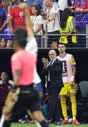 Football: 2026 World Cup Spain head coach Luis de la Fuente Castillo (2nd from R) reacts after Mikel Oyarzabal scored the team s first goal from the penalty spot in the first half of a World Cup semifinal football match against France at Dallas Stadium in Arlington, Texas, on July 14, 2026.  A14AA0005623082P