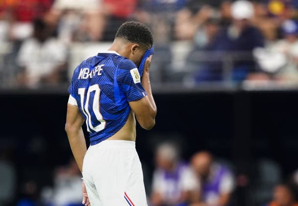 Football: 2026 World Cup France s Kylian Mbappe wipes his sweat in the second half of a World Cup semifinal football match against Spain at Dallas Stadium in Arlington, Texas, on July 14, 2026.  A14AA0005623116P