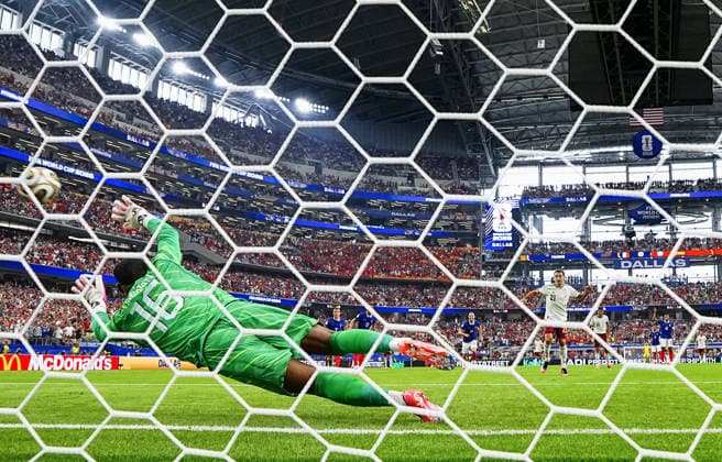 Football: 2026 World Cup Spain s Mikel Oyarzabal (R) scores the team s first goal from the penalty spot in the first half of a World Cup semifinal football match against France at Dallas Stadium in Arlington, Texas, on July 14, 2026.  A14AA0005623119P