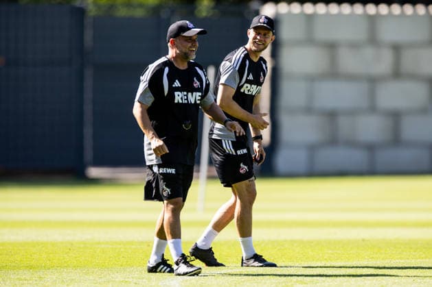 COLOGNE, GERMANY - JULY 15: Evangelos Sbonias(Assistant Coach 1. FC Koeln) and Rene Wagner (Head Coach 1. FC Koeln) laughing during a training session of season 2026 27 at Geissbockheim on July 15, 2026 in Cologne, Germany. North Rhine Westphalia Germany Copyright: xSteffiexWunderlx