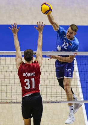 Men s Volleyball Nations League - Belgrade 2026 Slovenia s Rok Mozic spikes the ball against Germany s Yann Bohme during the MenÕs Volleyball Nations League Pool 7 match between Germany and Slovenia at Belgrade Arena on July 15, 2026 in Belgrade, Serbia. Belgrade Serbia Copyright: xSrdjanxStevanovicx x
