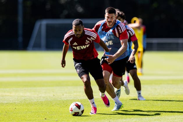 COLOGNE, GERMANY - JULY 15: Linton Maina (1. FC Koeln, 37) controls the ball against Luka Lochoshvili (1. FC Koeln, 24) during a training session of season 2026 27 at Geissbockheim on July 15, 2026 in Cologne, Germany. North Rhine Westphalia Germany Copyright: xSteffiexWunderlx