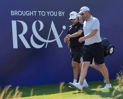 SOUTHPORT, ENGLAND - JULY 15: Min Woo Lee (AUS) and Bernd Wiesberger (AUT) walk from the first tee during practice at the 154th Open Championship at the Royal Birkdale Golf Club, Southport on July 15, 2026 in Merseyside, England The 154th British Open Championship