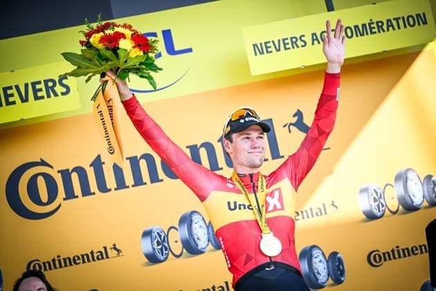 Norwegian Soren Waerenskjold of Uno-X Mobility celebrates on the podium after winning the stage 11 of the 2026 Tour de France cycling race, a stage of 161km from Vichy to Nevers, on Wednesday 15 July 2026. The 113th edition of the Tour de France starts on Saturday 4 July in Barcelona, Spain, and will finish in Paris, France on the 26th of July. JASPERxJACOBS  x181190610x