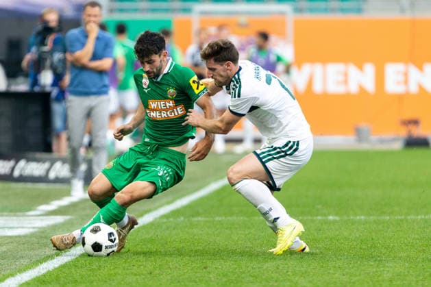 SOCCER - Rapid vs Panathinaikos, test match VIENNA,AUSTRIA,15.JUL.26 - SOCCER - ADMIRAL Bundesliga, Super League, SK Rapid Wien vs Panathinaikos Athen, test match. Image shows Yusuf Demir (Rapid) and Georgios Kyriakopoulos (Panathinaikos).  GEPAxpictures xPhilippxBrem