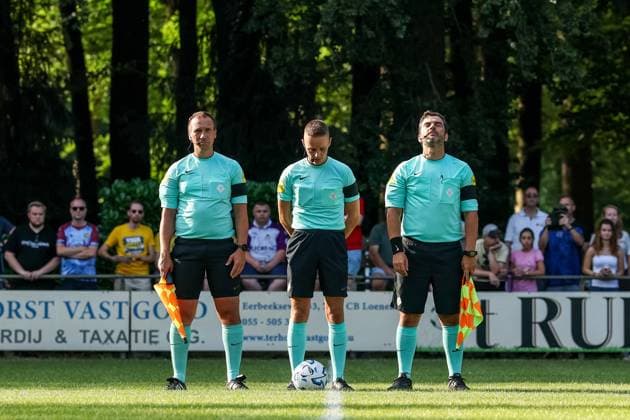 LOENEN , 15-07-2026 , Sportpark Lonapark , season 2026 2027 , Dutch pre-season football , friendly match between Vitesse and AEK Athens , picture shows Officials line up for a minute of silence for referee Rob Dieperink who passed away recently Vitesse - AEK Athens  x205043455x Copyright: