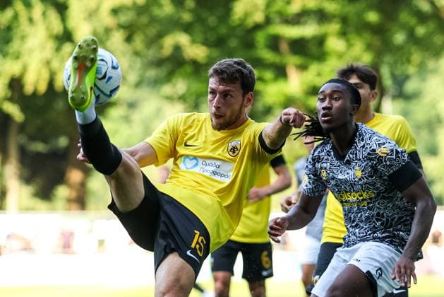 LOENEN , 15-07-2026 , Sportpark Lonapark , season 2026 2027 , Dutch pre-season football , friendly match between Vitesse and AEK Athens , picture shows AEK Athens player Martin Georgiev and Vitesse player Joao Pinto Vitesse - AEK Athens  x205043461x Copyright: