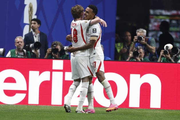 FIFA World Cup, WM, Weltmeisterschaft, Fussball 2026 semifinals - England vs Argentina Anthony Gordon (L) of England celebrates with teammate Morgan Rogers after scoring the opening goal in the FIFA World Cup 2026 semifinals match England against Argentina, in Atlanta, USA, 15 July 2026. ATLANTA United States  Copyright: xWILLxOLIVERx