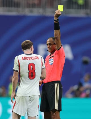 (260716) -- ATLANTA, July 16, 2026 -- Elliot Anderson (L) of England is shown a yellow card during the semifinal match between Argentina and England at the 2026 FIFA World Cup, WM, Weltmeisterschaft, Fussball at Atlanta Stadium in Atlanta, the United States, July 15, 2026. ) (SP)U.S.-ATLANTA-FOOTBALL-FIFA WORLD CUP-SEMIFINAL-ARG VS ENG CaoxCan 