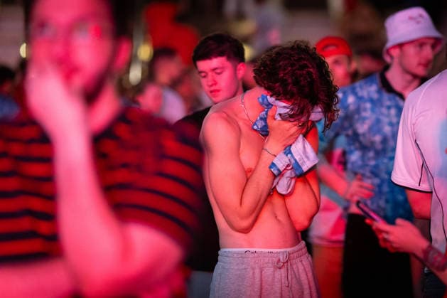 July 15, 2026, Manchester, United Kingdom: An England fan seen covering his face after England lost 2-1 to Argentina in the World Cup semi-final. The sold-out Castlefield Bowl, organised by The Road Victory, saw thousands of fans come together to watch England play Argentina in a World Cup battle for the first time since France 98. England Vs Argentina World Cup Semi Final In Manchester, UK - 15 JULY 2026.  - ZUMAs197 20260715_aaa_s197_173 Copyright: xAndyxBartonx