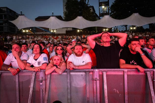 July 15, 2026, Manchester, United Kingdom: England fans react to going down 2-1 to Argentina during the highly anticipated World Cup semi-final. The sold-out Castlefield Bowl, organised by The Road Victory, saw thousands of fans come together to watch England play Argentina in a World Cup battle for the first time since France 98. England Vs Argentina World Cup Semi Final In Manchester, UK - 15 JULY 2026.  - ZUMAs197 20260715_aaa_s197_176 Copyright: xAndyxBartonx