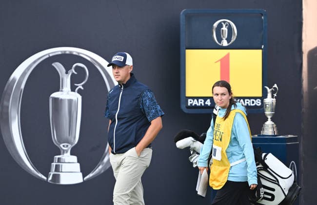 Joe Dean and his caddie and fiancee, Emily Lyle, walk onto the 1st Tee 154th Open Golf Championships, Royal Birkdale, Southport, UK - 16 Jul 2026Southport Royal Birkdale United Kingdom  Copyright: xGreigxCowie Shutterstockx 16988293n