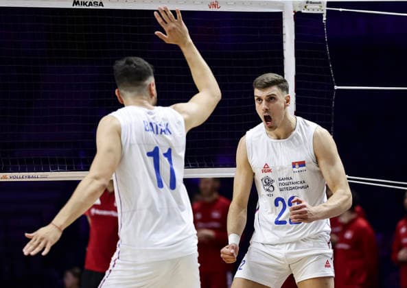 Men s Volleyball Nations League - Belgrade 2026 Serbia s Veljko Masulovic (R) and Serbia s Aleksa Batak react during the MenÕs Volleyball Nations League Pool 7 match between Serbia and Turkiye at Belgrade Arena on July 15, 2026 in Belgrade, Serbia. Belgrade Serbia Copyright: xSrdjanxStevanovicx x