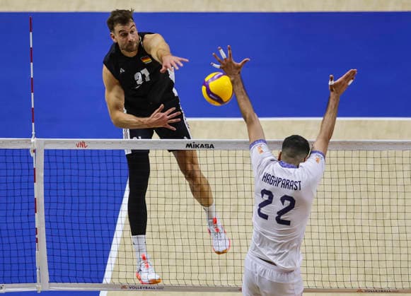 WomenÕs Volleyball Nations League - Belgrade 2026 Germany s Yann Bohme spikes the ball against IranÕs Ali Haghparast during the MenÕs Volleyball Nations League Pool 7 match between Germany and Iran at Belgrade Arena on July 16, 2026 in Belgrade, Serbia. Belgrade Serbia Copyright: xSrdjanxStevanovicx x