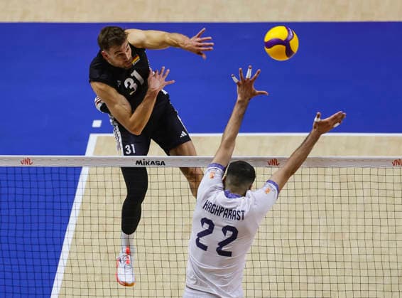 WomenÕs Volleyball Nations League - Belgrade 2026 Germany s Yann Bohme spikes the ball against IranÕs Ali Haghparast during the MenÕs Volleyball Nations League Pool 7 match between Germany and Iran at Belgrade Arena on July 16, 2026 in Belgrade, Serbia. Belgrade Serbia Copyright: xSrdjanxStevanovicx x