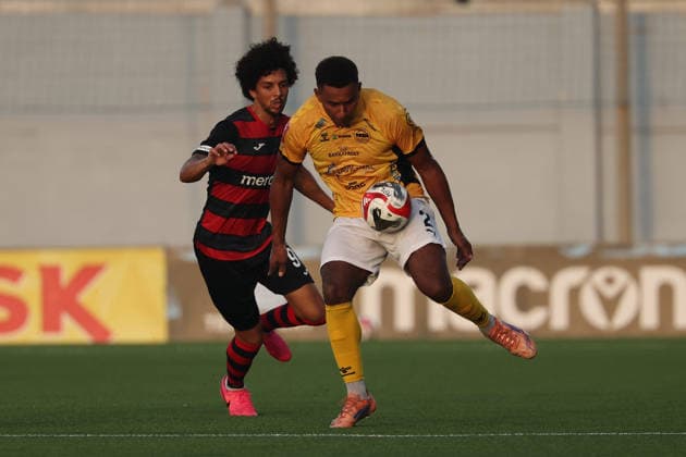 Sammy Skytte (right) of Runavik is is followed by Marcelina Emerson of Hamrun Spartans during the UEFA Conference League First Qualifying Round, 2nd Leg match between Hamrun Spartans and Runavik at Centenary Stadium, Ta Qali, Malta on 16 July, 2026. Hamrun Spartans v Runavik - UEFA Conference League First Qualifying Round 1st Leg