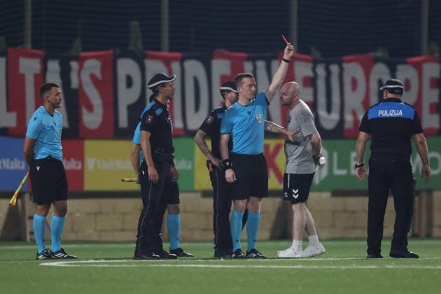 UEFA appointed match referee Jeremy Muller shows a red card to a Hamrun Spartans official after the UEFA Conference League First Qualifying Round, 2nd Leg match between Hamrun Spartans and Runavik at Centenary Stadium, Ta Qali, Malta on 16 July, 2026. Hamrun Spartans v Runavik - UEFA Conference League First Qualifying Round 1st Leg