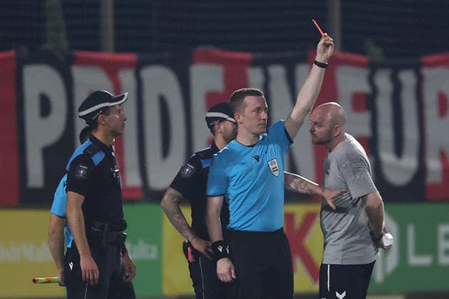 UEFA appointed match referee Jeremy Muller shows a red card to a Hamrun Spartans official (not in picture) after the UEFA Conference League First Qualifying Round, 2nd Leg match between Hamrun Spartans and Runavik at Centenary Stadium, Ta Qali, Malta on 16 July, 2026. Hamrun Spartans v Runavik - UEFA Conference League First Qualifying Round 1st Leg