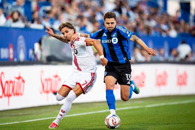July 16, 2026, Montreal, Pq, Canada: Toronto FC s Theo Corbeanu (7) and CF Montreal s Luca Petrasso (13) vie for possession of the ball during first half MLS, Fussball Herren, USA soccer action, in Montreal on Thursday, July 16, 2026. Canada News - July 16, 2026  - ZUMAc35_ 20260716_zaf_c35_120 Copyright: xChristopherxKatsarovx