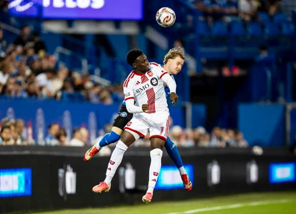 July 16, 2026, Montreal, Pq, Canada: Toronto FC s Derrick Etienne Jr. (front) and CF Montreal s Dawid Bugaj (27) head the ball during second half MLS, Fussball Herren, USA soccer action, in Montreal on Thursday, July 16, 2026. Canada News - July 16, 2026  - ZUMAc35_ 20260716_zaf_c35_145 Copyright: xChristopherxKatsarovx