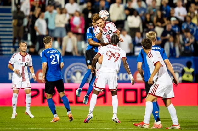 July 16, 2026, Montreal, Pq, Canada: Toronto FC s Josh Sargent (top right) and CF Montreal s Jalen Neal (top left) leap for a header off a corner kick during second half MLS, Fussball Herren, USA soccer action, in Montreal on Thursday, July 16, 2026. Canada News - July 16, 2026  - ZUMAc35_ 20260716_zaf_c35_149 Copyright: xChristopherxKatsarovx