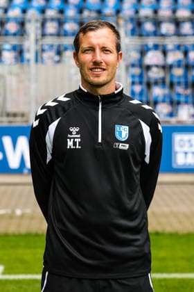 Torwart-Trainer Matthias Tischer, 1. FC Magdeburg - 2. Fussball Bundesliga Porträttermin 2. BL 2026 2027 offizieller Fototermin 1. FC Magdeburg in der Avnet Arena in Magdeburg - Porträt, Portrait, Einzelbild, Deutschland, Fussball, Maenner, GER, 16.07.2026 *** Goalkeeper Coach Matthias Tischer, 1. FC Magdeburg, 2. Bundesliga, Portrait Session, 2026–2027 Season, Official Photo Session, 1. FC Magdeburg at the Avnet Arena in Magdeburg, Portrait, Individual Photo, Germany, Soccer, Men, GER, July 16, 2026 Christian Schroedter