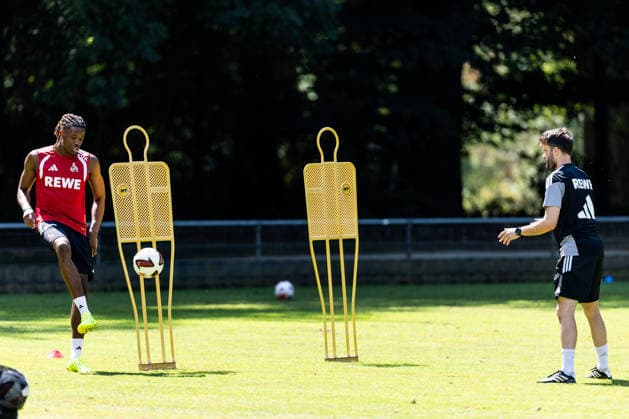 COLOGNE, GERMANY - JULY 16: Elias Bakatukanda (1. FC Koeln) training individually with Leif Frach (Athletics Coach 1. FC Koeln) during a training session of season 2026 27 at Geissbockheim on July 16, 2026 in Cologne, Germany. North Rhine Westphalia Germany Copyright: xSteffiexWunderlx