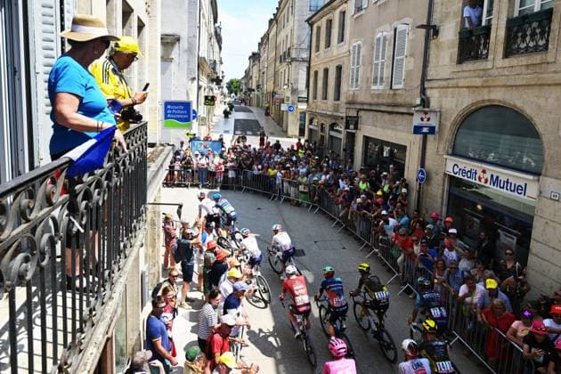 People watch from the balcony at the start of stage 13 of the 2026 Tour de France cycling race, a stage of 205km from Dole to Belfort, on Friday 17 July 2026. The 113th edition of the Tour de France starts on Saturday 4 July in Barcelona, Spain, and will finish in Paris, France on the 26th of July. DAVIDxPINTENS  x181329327x