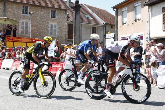 Belgian Victor Campenaerts of Team Visma-Lease a Bike, German Michel Hessmann of Movistar Team and American Brandon McNulty of UAE Team Emirates XRG pictured in action during stage 13 of the 2026 Tour de France cycling race, a stage of 205km from Dole to Belfort, on Friday 17 July 2026. The 113th edition of the Tour de France starts on Saturday 4 July in Barcelona, Spain, and will finish in Paris, France on the 26th of July. POOLxLUCAxBETTINI  x181334886x