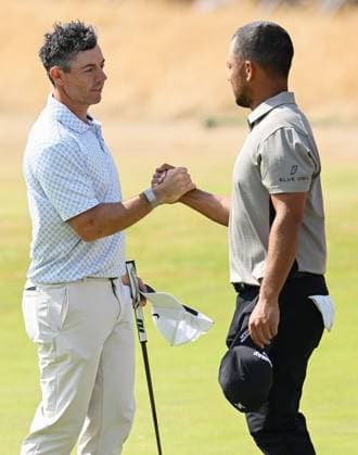 Rory McIlroy (NIR) finishes his round at -1, and shakes hands with Xander Schauffele (USA) who misses the cut whilst he will play over the weekend 154th Open Golf Championships, Royal Birkdale, Southport, UK - 17 Jul 2026Southport Royal Birkdale United Kingdom  Copyright: xGreigxCowie Shutterstockx 16988294cm