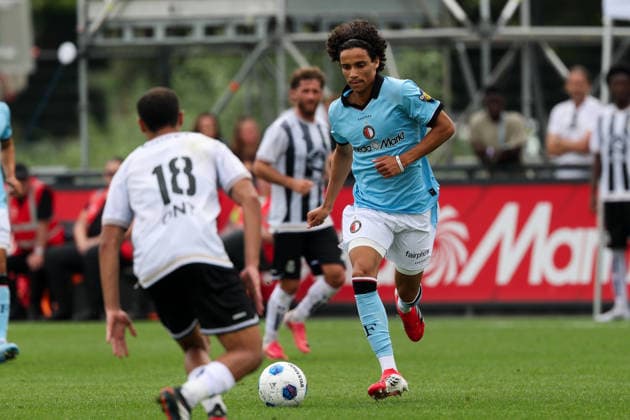 2026-07-17 Feyenoord v Sporting Charleroi - Pre Season Friendly ROTTERDAM, NETHERLANDS - JULY 17: Gjivai Zechiel of Feyenoord is challenged by Yassine Khalifi of Sporting Charleroi during the Pre Season Friendly match between Feyenoord and Sporting Charleroi at Sportcomplex Varkenoord on July 17, 2026 in Rotterdam, Netherlands. Rotterdam Sportcomplex Varkenoord Netherlands Content not available for redistribution in The Netherlands directly or indirectly through any third parties. Copyright: xHansxvanxderxValkx