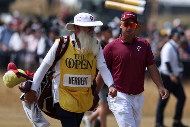 RECORD DATE NOT STATED 17th July 2026; Royal Birkdale Golf Club, Southport, Merseyside, England; The Open Championship Day Two; Lucas Herbert (AUS) and his caddie Nick Pugh on the 18th fairway as he completes his round of 62 DavidxBlunsden