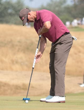 Australian Adam Scott putts on the 9th green during the Second round at the 154th Open Championship at Royal Birkdale in Southport, on Friday, July 17, 2026.  LON2026071706 HUGOxPHILPOTT