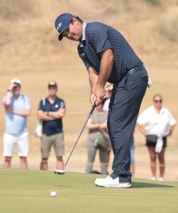 American Patrick Reed putts on the 9th green during the Second round at the 154th Open Championship at Royal Birkdale in Southport, on Friday, July 17, 2026.  LON2026071710 HUGOxPHILPOTT