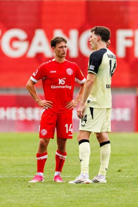 MAINZ, GERMANY - JULY 17: William Boeving (1. FSV Mainz 05, 14) and Jacob Rasmussen (1. FC Kaiserslautern, 14) having a chat after the exhibition game between 1. FSV Mainz 05 vs. 1. FC Kaiserslautern at Bruchweg Stadium in preparation for the Bundesliga season 2026 27 on July 17, 2026 in Mainz, Germany. DFL REGULATIONS PROHIBIT ANY USE OF PHOTOGRAPHS AS IMAGE SEQUENCES AND OR QUASI-VIDEO. Rhineland-Palatinate Germany Copyright: xStephanxHahnex