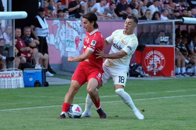 Football - Friendly - FCW vs UNION Berlin - Theo Golliard (red) and Josip Juranovic (white) Winterthur Schützenwiese Zürich Schweiz Copyright: xSergioxBrunettix