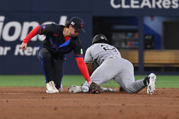 July 17, 2026, Toronto, On, Canada: Chicago White Sox Braden Montgomery (24) slides safely into second with a stolen base ahead of a tag by Toronto Blue Jays infielder Ernie Clement (22) during second inning MLB, Baseball Herren, USA baseball action in Toronto on Friday, July 17, 2026. Canada News - July 17, 2026  - ZUMAc35_ 20260717_zaf_c35_093 Copyright: xJonxBlackerx