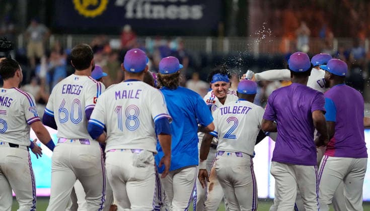 July 17, 2026: The Royals celebrate after a walk off hit by Kansas City Royals catcher Carter Jensen (22) in the 10th inning against the Padres at Kauffman Stadium Kansas City, Missouri. CSM. Kansas City United States - ZUMAc04_ 20260717_zma_c04_178 Copyright: xJonxRobichaudx