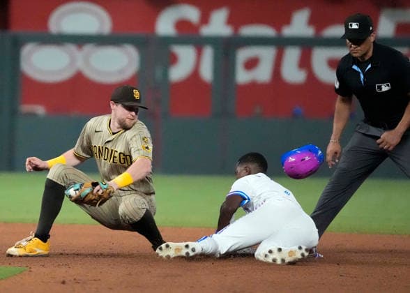 July 17, 2026: Kansas City Royals second baseman Tyler Tolbert (2) slides in safely against San Diego Padres second baseman Jake Cronenworth (9) at Kauffman Stadium Kansas City, Missouri. CSM. Kansas City United States - ZUMAc04_ 20260717_zma_c04_190 Copyright: xJonxRobichaudx