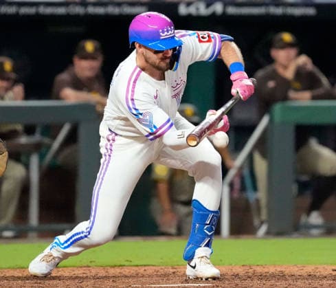 July 17, 2026: Kansas City Royals left fielder Nick Loftin (12) lays down a bunt single in the 10th inning against the Padres at Kauffman Stadium Kansas City, Missouri. CSM. Kansas City United States - ZUMAc04_ 20260717_zma_c04_192 Copyright: xJonxRobichaudx